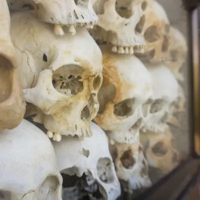 Skulls packed into a wall