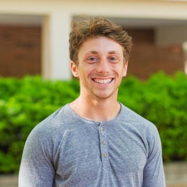 Austin, a Biology student at Western, smiling
