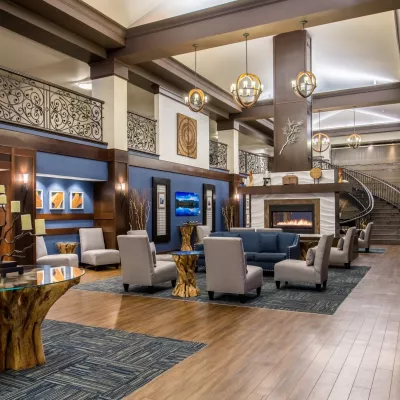 View of inner lobby of Four Points Hotel complete with fireplace.