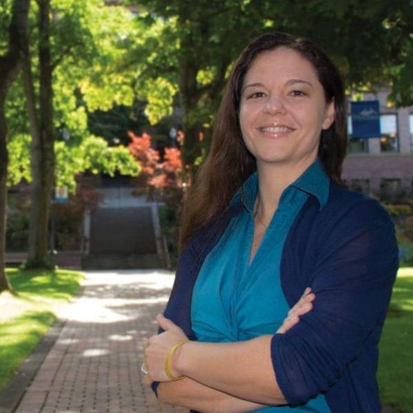 Katrina Buckman standing in front of Old Main