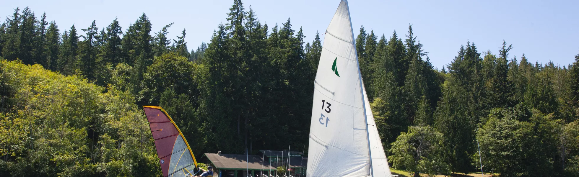 Student sail sailboats on Lake Whatcom.